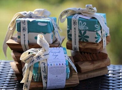 2 Bars of Shea Butter soap on an Olive wood soap dish